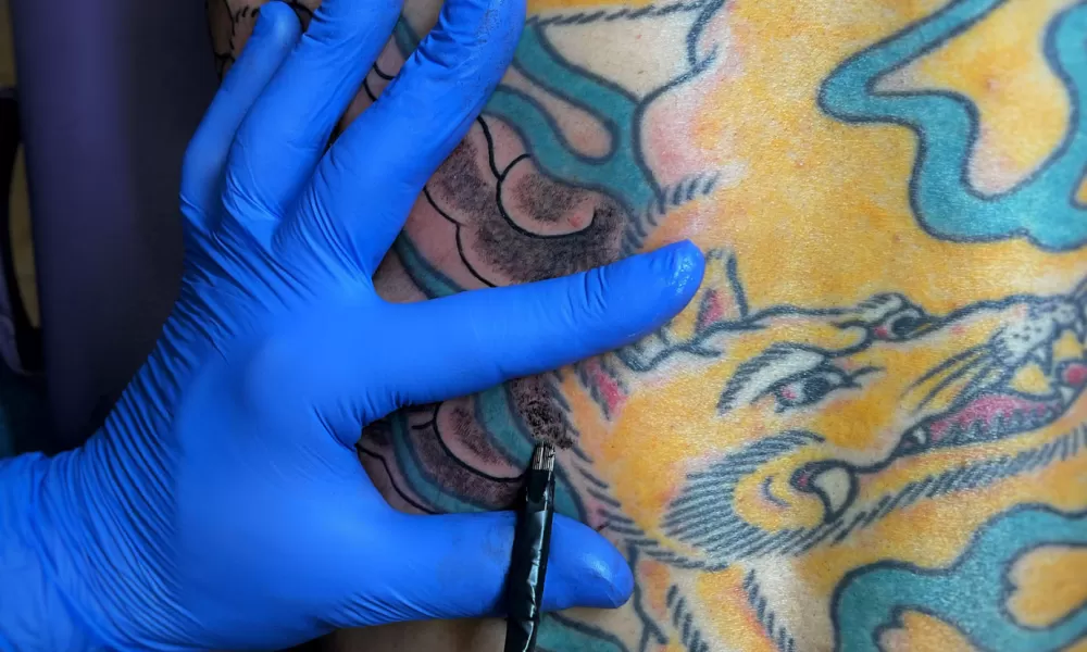 Traditional Tebori method tattoos